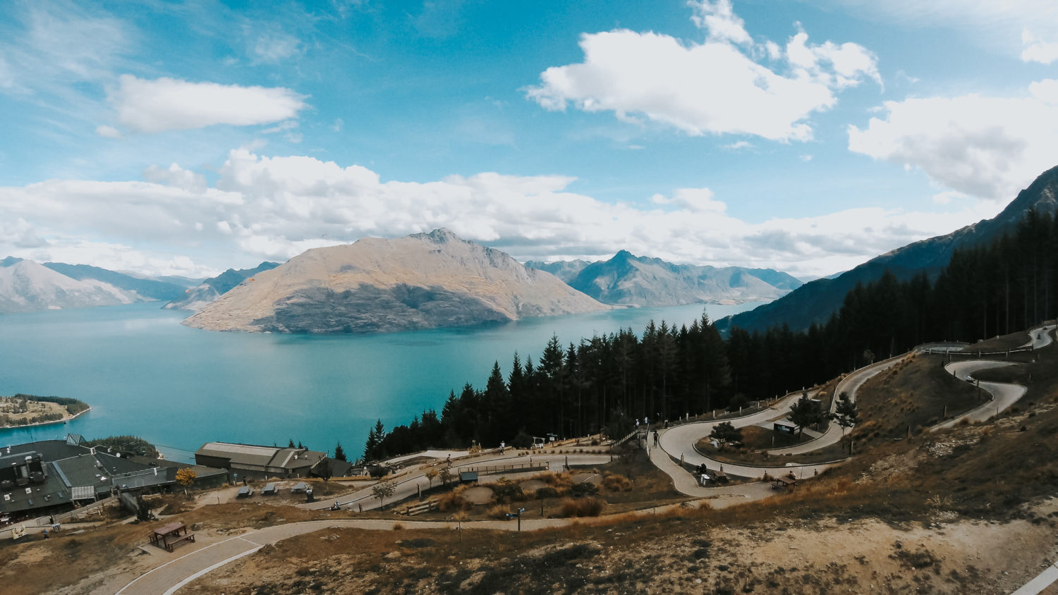 View from the top of the Skyline Gongola, Luge tracking with the Queenstown Mountains behind